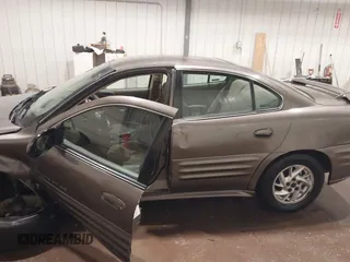 2002 Pontiac Grand Am SE1 with VIN 1G2NF52FX2C128240, listed as a IAAI auction lot 41356415 with 15,900 mi miles. Bid and sale history available at carsss.com. Image 14.