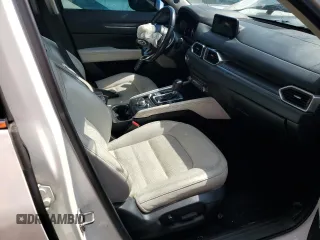 2019 Mazda CX-5 Grand Touring with VIN JM3KFADM6K1581261, listed as a Copart auction lot 59965175 with 127,837 mi miles and Salvage title. Bid and sale history available at DreamBid. Image 7.