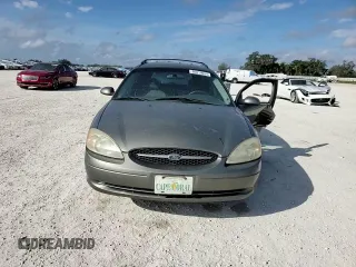 2003 Ford Taurus SE Standard with VIN 1FAFP58U33A259080, listed as a Copart auction lot 86819024 with 143,482 mi miles and Salvage Title. Bid and sale history available at carsss.com. Image 11.