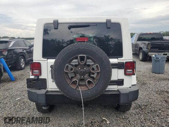 2018 Jeep Wrangler Unlimited Sahara with VIN 1C4BJWEG2JL851277, listed as a Copart auction lot 63631645 with 83,851 mi miles and Salvage title. Bid and sale history available at DreamBid. Image 6.