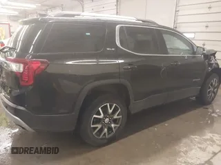 2021 GMC Acadia SLE with VIN 1GKKNRLS9MZ232758, listed as a IAAI auction lot 41548170 with 56,714 mi miles. Bid and sale history available at carsss.com. Image 4.