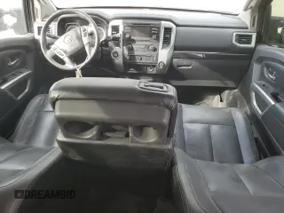 2016 Nissan Titan S with VIN 1N6BA1F14GN517646, listed as a Copart auction lot 55381575 with 147,654 mi miles and Salvage title. Bid and sale history available at DreamBid. Image 8.