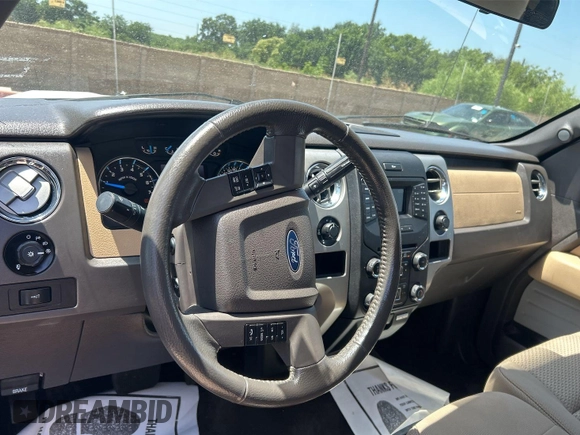 2014 Ford F-150 XL with VIN 1FTFW1EF8EKF95400, listed as a IAAI auction lot 42414535 with 148,227 mi miles and . Bid and sale history available at DreamBid. Image 1.
