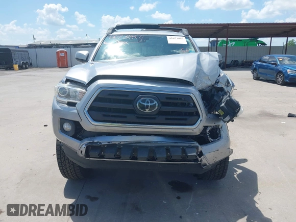2018 Toyota Tacoma SR with VIN 3TMCZ5AN2JM172829, listed as a IAAI auction lot 42073847 with 136,671 mi miles and . Bid and sale history available at carsss.com. Image 13.