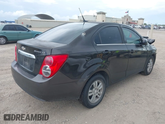 2013 Chevrolet Sonic LT with VIN 1G1JC5SH7D4236146, listed as a IAAI auction lot 39859991 with 135,006 mi miles and . Bid and sale history available at DreamBid. Image 4.
