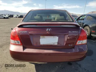 2001 Hyundai Elantra GLS z VIN KMHDN45D41U107399, wystawiony jako Copart lot #52658745 z przebiegiem 65 459 mil mil oraz Szkoda całkowita • Salvage title. Historia ofert i sprzedaży dostępna na DreamBid. Obrazek 6.