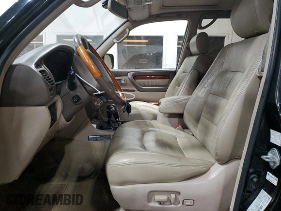 2002 Lexus LX 470 z VIN JTJHT00W023515545, wystawiony jako Copart lot #79218054 z przebiegiem 310 334 mil mil oraz Szkoda całkowita • Salvage title. Historia ofert i sprzedaży dostępna na DreamBid. Obrazek 7.