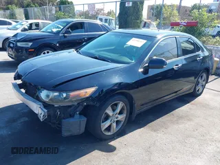 2011 Acura TSX with VIN JH4CU2F6XBC013766, listed as a IAAI auction lot 42398282 with 156,565 mi miles and . Bid and sale history available at DreamBid. Image 2.