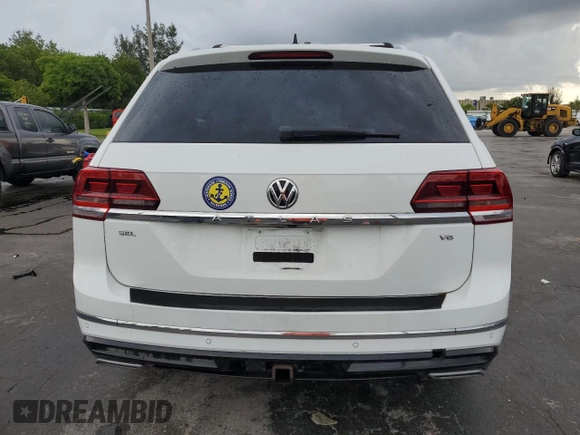 2018 Volkswagen Atlas SEL with VIN 1V2SR2CA1JC520785, listed as a Copart auction lot 65837825 with 66,125 mi miles and Salvage title. Bid and sale history available at DreamBid. Image 6.