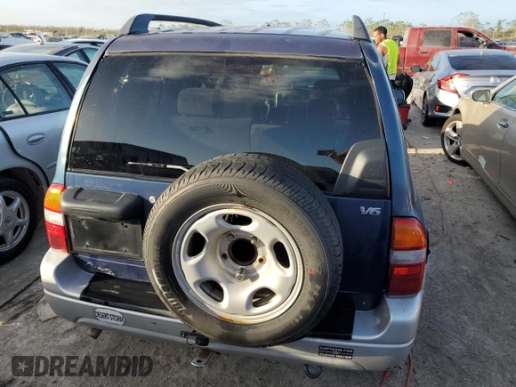 2003 Suzuki Grand Vitara z VIN JS3TE62V534100751, wystawiony jako Copart lot #76714894 z przebiegiem Nie podano mil oraz Nie do naprawy • Non repairable. Historia ofert i sprzedaży dostępna na DreamBid. Obrazek 6.