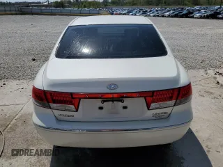 2007 Hyundai Azera SE z VIN KMHFC46F27A181641, wystawiony jako Copart lot #52485025 z przebiegiem 223 170 mil mil oraz Nie do naprawy • Non repairable. Historia ofert i sprzedaży dostępna na DreamBid. Obrazek 6.
