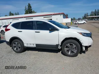 2019 Honda CR-V LX z VIN 5J6RW6H34KL001445, wystawiony jako IAAI lot #42369616 z przebiegiem 13 553 mil mil oraz . Historia ofert i sprzedaży dostępna na DreamBid. Obrazek 14.