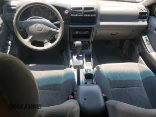 2003 Isuzu Rodeo z VIN 4S2CK58W734311374, wystawiony jako Copart lot #57949325 z przebiegiem 247 580 mil mil oraz Tytuł czysty. Historia ofert i sprzedaży dostępna na DreamBid. Obrazek 8.