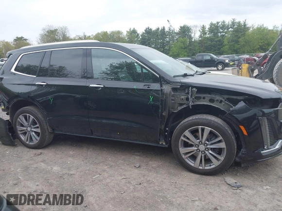 2022 Cadillac XT6 Premium Luxury with VIN 1GYKPDRS5NZ149971, listed as a IAAI auction lot 42259140 with 51,704 mi miles and . Bid and sale history available at DreamBid. Image 13.