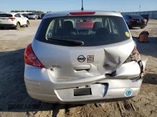 2009 Nissan Versa S z VIN 3N1BC13E89L408407, wystawiony jako Copart lot #49131445 z przebiegiem 116 707 mil mil oraz Szkoda całkowita • Salvage title. Historia ofert i sprzedaży dostępna na DreamBid. Obrazek 6.