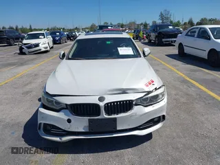 2015 BMW 4 Series 428i with VIN WBA4A5C58FGK15335, listed as a IAAI auction lot 41723243 with 152,652 mi miles and . Bid and sale history available at DreamBid. Image 11.