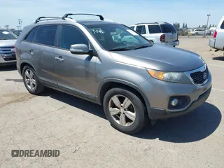 2013 Kia Sorento EX with VIN 5XYKU4A25DG411785, listed as a IAAI auction lot 42204291 with 203,501 mi miles and . Bid and sale history available at carsss.com. Image 1.