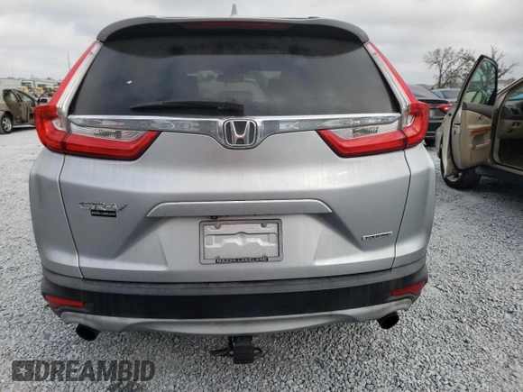 2018 Honda CR-V Touring with VIN 7FARW1H93JE055337, listed as a Copart auction lot 45045305 with 74,776 mi miles and Salvage Title. Bid and sale history available at DreamBid. Image 6.