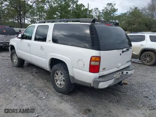 2003 Chevrolet Suburban LT with VIN 3GNFK16Z23G280270, listed as a IAAI auction lot 41627119 with 246,282 mi miles. Bid and sale history available at carsss.com. Image 3.
