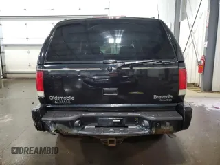 2001 Oldsmobile Bravada z VIN 1GHDT13W912194316, wystawiony jako Copart lot #49438485 z przebiegiem 124 380 mil mil oraz Szkody całkowita. Historia ofert i sprzedaży dostępna na DreamBid. Obrazek 6.