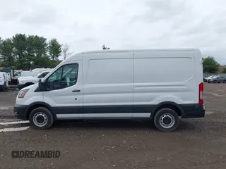 2023 Ford Transit Cargo with VIN 1FTBR1C89PKB29455, listed as a IAAI auction lot 41839680 with 21,570 mi miles. Bid and sale history available at carsss.com. Image 14.