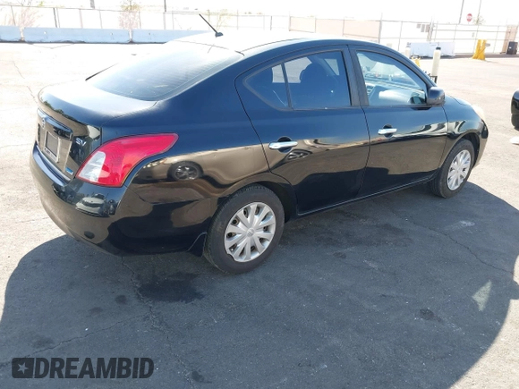 2012 Nissan Versa SL with VIN 3N1CN7AP8CL848298, listed as a IAAI auction lot 42015098 with 143,689 mi miles. Bid and sale history available at carsss.com. Image 4.
