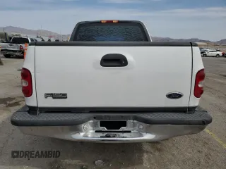 1999 Ford F-150 XL with VIN 1FTZX0721XKA49751, listed as a Copart auction lot 52429195 with Not provided miles and Salvage title. Bid and sale history available at DreamBid. Image 6.