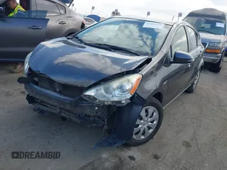 2014 Toyota Prius One with VIN JTDKDTB30E1575075, listed as a IAAI auction lot 41407539 with 150,470 mi miles and . Bid and sale history available at DreamBid. Image 2.