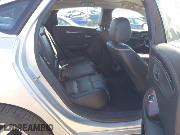 2015 Chevrolet Impala LTZ with VIN 2G1165S34F9101489, listed as a IAAI auction lot 42141525 with 149,037 mi miles and . Bid and sale history available at DreamBid. Image 8.