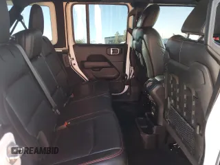 2023 Jeep Wrangler Rubicon Farout с VIN 1C4JJXFM2PW588219, выставлен на аукционе Copart как лот 77599774 с пробегом 38 914 миль миль и Списание • Salvage title. История ставок и продаж доступна на DreamBid. Изображение 12.