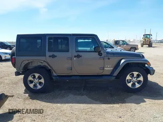 2017 Jeep Wrangler Unlimited Sahara with VIN 1C4BJWEG7HL641347, listed as a IAAI auction lot 41833356 with 84,735 mi miles. Bid and sale history available at carsss.com. Image 14.