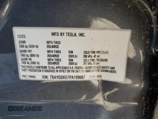 2023 Tesla Model Y Long Range z VIN 7SAYGDEE7PA199067, wystawiony jako Copart lot #52463215 z przebiegiem 30 978 mil mil oraz Szkoda całkowita • Salvage title. Historia ofert i sprzedaży dostępna na DreamBid. Obrazek 15.