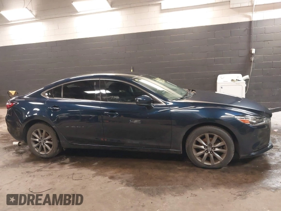 2018 Mazda Mazda6 Sport with VIN JM1GL1UMXJ1330989, listed as a IAAI auction lot 41355353 with 52,869 mi miles. Bid and sale history available at carsss.com. Image 13.