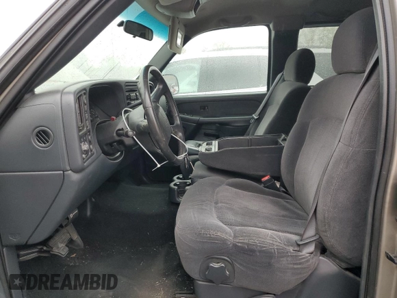 2002 Chevrolet Silverado 1500 LT with VIN 2GCEK19T821387813, listed as a Copart auction lot 50596015 with 128,739 mi miles and Salvage Title. Bid and sale history available at carsss.com. Image 7.