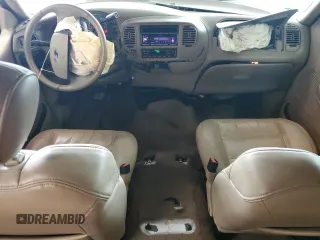 2003 Ford F-150 XLT with VIN 1FTRW08L23KA65560, listed as a Copart auction lot 61349145 with 207,887 mi miles and Salvage title. Bid and sale history available at DreamBid. Image 8.