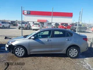 2021 Kia Rio LX with VIN 3KPA24AD1ME398923, listed as a IAAI auction lot 41031202 with 48,919 mi miles. Bid and sale history available at carsss.com. Image 14.