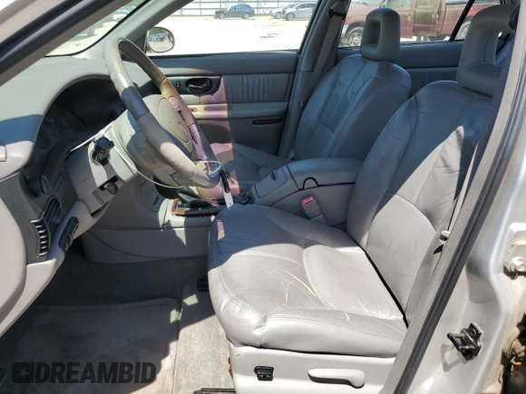 2002 Buick Regal LS z VIN 2G4WB55KX21144458, wystawiony jako Copart lot #54374445 z przebiegiem 97 900 mil mil oraz Czysty tytuł • Clean title. Historia ofert i sprzedaży dostępna na DreamBid. Obrazek 7.