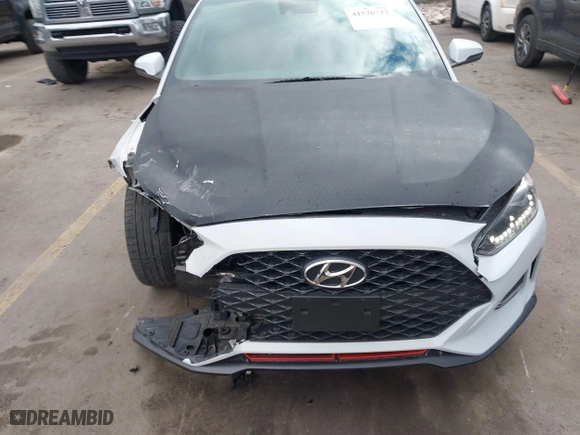 2019 Hyundai Veloster Turbo with VIN KMHTH6AB3KU020193, listed as a IAAI auction lot 41526722 with 54,697 mi miles. Bid and sale history available at carsss.com. Image 6.