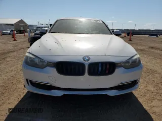 2013 BMW 3 Series 328i xDrive with VIN WBA3B3C51DF532714, listed as a Copart auction lot 57854735 with 140,650 mi miles and Salvage title. Bid and sale history available at DreamBid. Image 5.