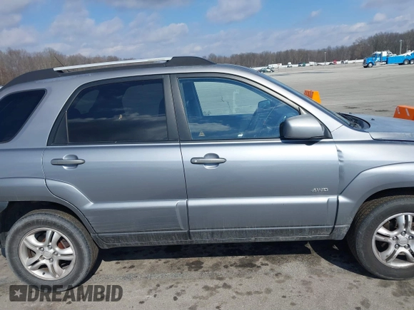 2005 Kia Sportage LX with VIN KNDJE723757102304, listed as a IAAI auction lot 41689073 with 125,276 mi miles and . Bid and sale history available at carsss.com. Image 14.