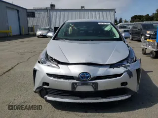2021 Toyota Prius L Eco with VIN JTDKAMFUXM3130587, listed as a Copart auction lot 53167245 with 11,560 mi miles and Salvage title. Bid and sale history available at DreamBid. Image 5.