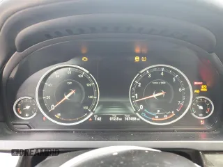 2015 BMW 7 Series 750i z VIN WBAYA8C51FG197764, wystawiony jako Copart lot #67095554 z przebiegiem 167 458 mil mil oraz Szkoda całkowita • Salvage title. Historia ofert i sprzedaży dostępna na DreamBid. Obrazek 9.