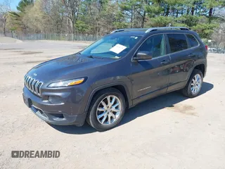 2014 Jeep Cherokee Limited with VIN 1C4PJMDSXEW309171, listed as a IAAI auction lot 42038729 with 74,973 mi miles. Bid and sale history available at carsss.com. Image 2.