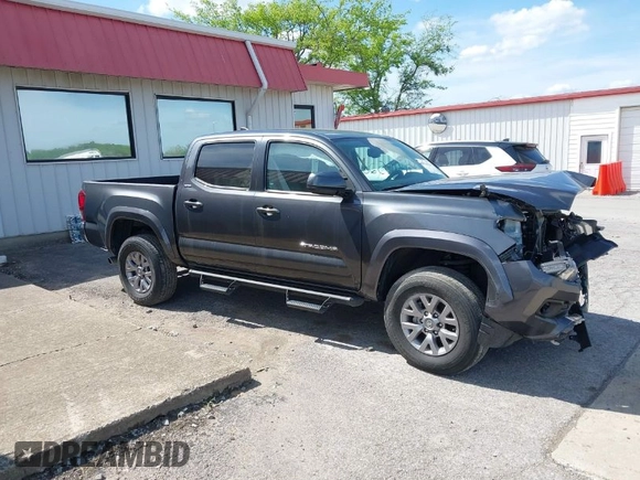 2018 Toyota Tacoma SR5 with VIN 3TMAZ5CN9JM070187, listed as a IAAI auction lot 41816520 with 43,068 mi miles and . Bid and sale history available at DreamBid. Image 1.