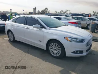 2016 Ford Fusion Energi SE Luxury with VIN 3FA6P0PU6GR320759, listed as a IAAI auction lot 41305339 with 105,483 mi miles. Bid and sale history available at carsss.com. Image 1.