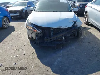 2019 Nissan Sentra S z VIN 3N1AB7AP4KY265082, wystawiony jako IAAI lot #41642989 z przebiegiem 75 937 mil mil oraz . Historia ofert i sprzedaży dostępna na DreamBid. Obrazek 6.