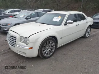 2006 Chrysler 300 C with VIN 2C3LA63H06H189644, listed as a IAAI auction lot 41718103 with 290,418 mi miles. Bid and sale history available at carsss.com. Image 2.