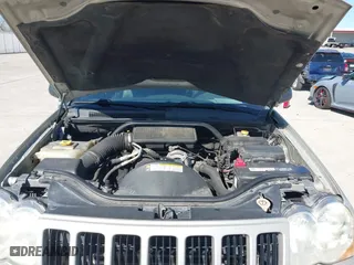 2010 Jeep Grand Cherokee Laredo with VIN 1J4PS4GK1AC111965, listed as a IAAI auction lot 41776362 with 209,042 mi miles. Bid and sale history available at carsss.com. Image 10.
