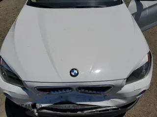 2014 BMW X1 sDrive28i z VIN WBAVM1C51EVW51832, wystawiony jako Copart lot #60153925 z przebiegiem 101 781 mil mil oraz Szkoda całkowita • Salvage title. Historia ofert i sprzedaży dostępna na DreamBid. Obrazek 11.