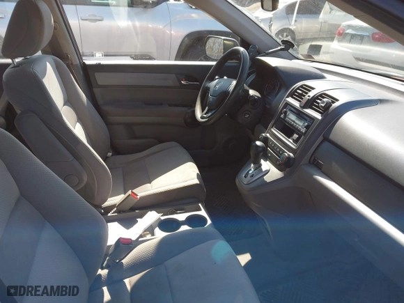 2008 Honda CR-V LX with VIN JHLRE48368C071019, listed as a IAAI auction lot 42047164 with 214,536 mi miles. Bid and sale history available at carsss.com. Image 5.